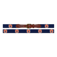 Flat view of Needlepoint Monogrammed Auburn Belt Dark Navy with brown leather trim and a brass buckle