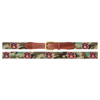 Flat view of Needlepoint Auburn Camo Belt Final Sale with brown leather trim and a brass buckle