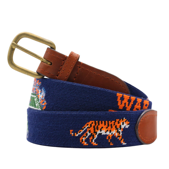 Monogrammed Auburn Life Needlepoint Belt Dark Navy coiled, with brown leather trim and a brass buckle