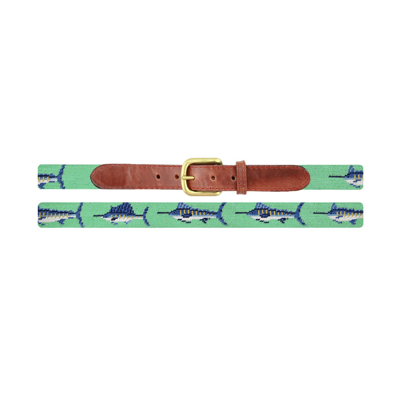 Flat view of Needlepoint Billfish Children's Belt Mint with brown leather trim and a brass buckle