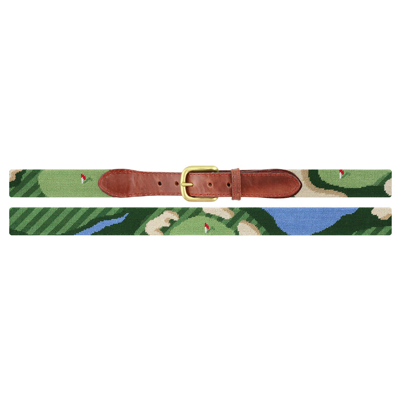 Flat view of Needlepoint Birds Eye Golf Belt with brown leather trim and a brass buckle