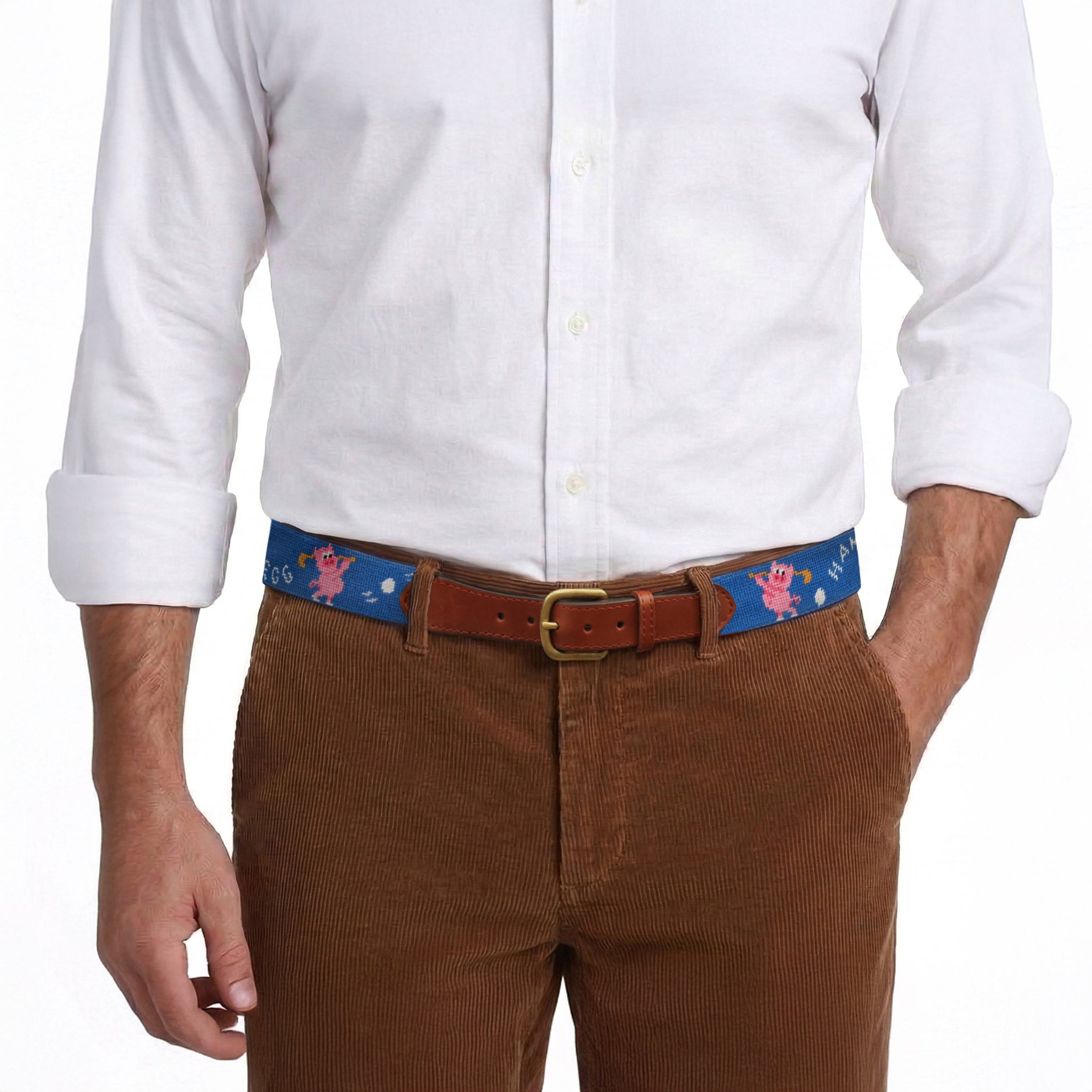 Model wearing Smathers and Branson Brown Corduroy Pants with Ham and Egging needlepoint pattern