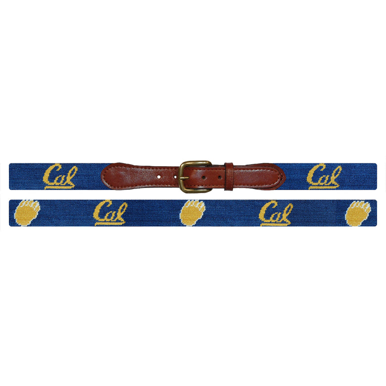 Flat view of Needlepoint UC Berkeley Belt Classic Navy with brown leather trim and a brass buckle