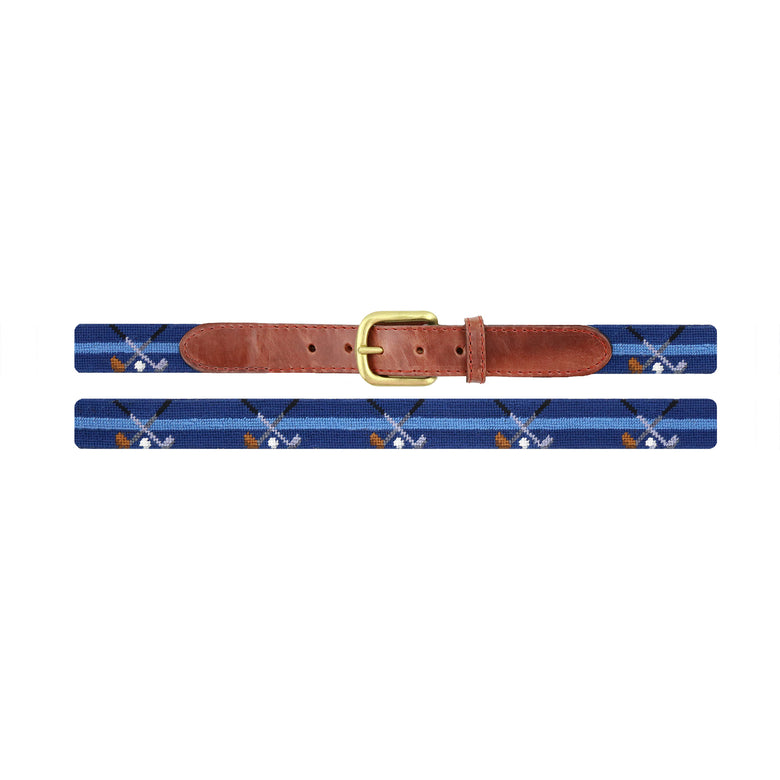 Crossed golf clubs needlepoint children's belt on a classic navy background with brown leather and a brass buckle.