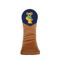 Chestnut golf headcover with dancing bear logo and dark navy background