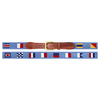 Nautical flag belt with brown leather, brass buckle on a white background