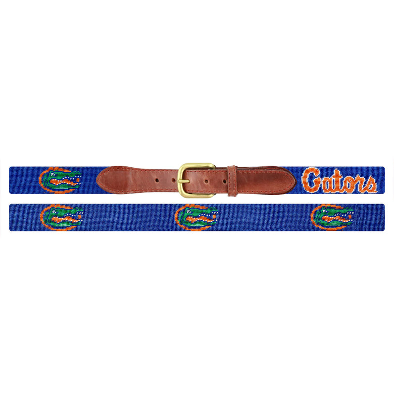 Flat view of Needlepoint University of Florida Belt Royal with brown leather trim and a brass buckle