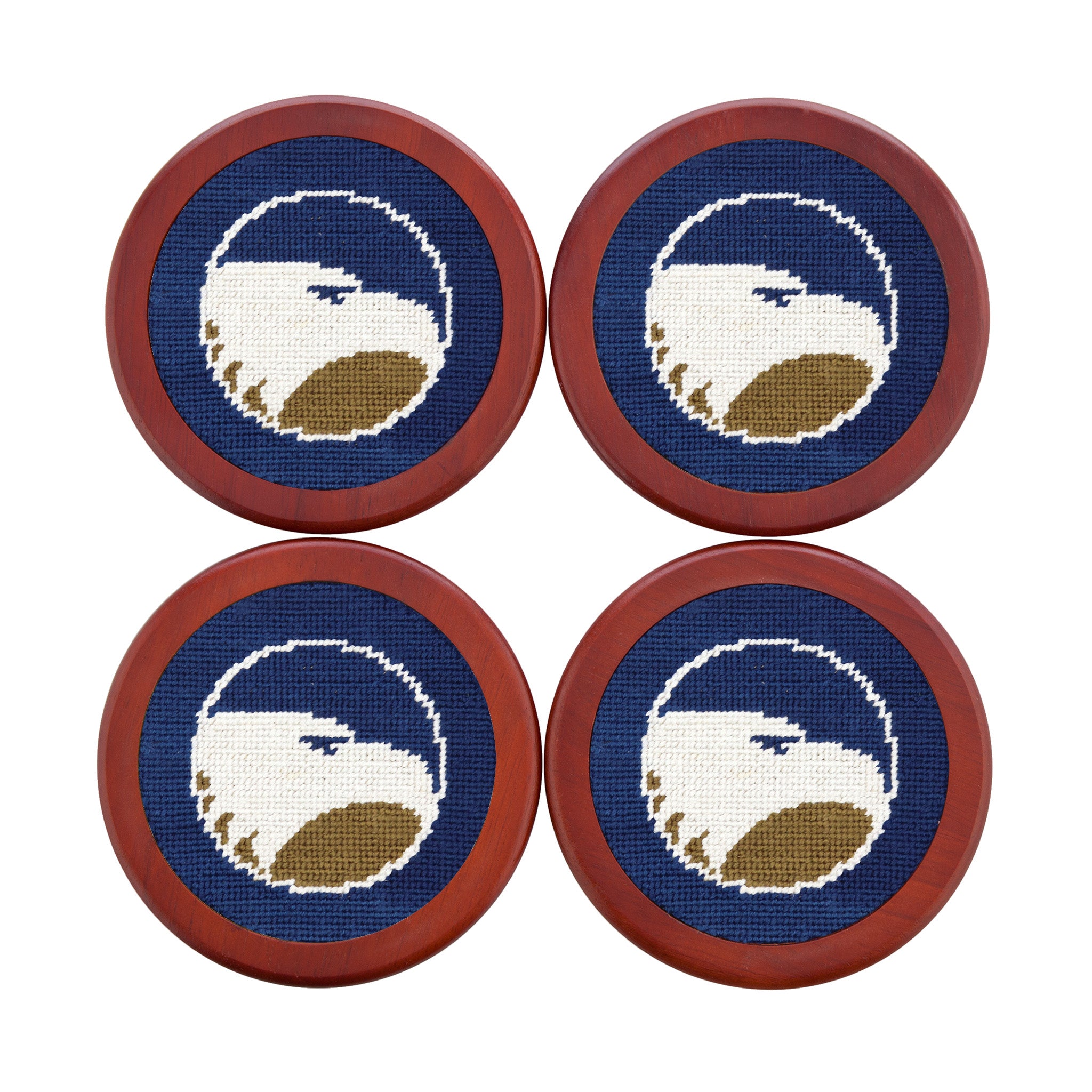 Classic navy coasters featuring the gold Georgia Southern eagle logo in needlepoint, shown laid flat.
