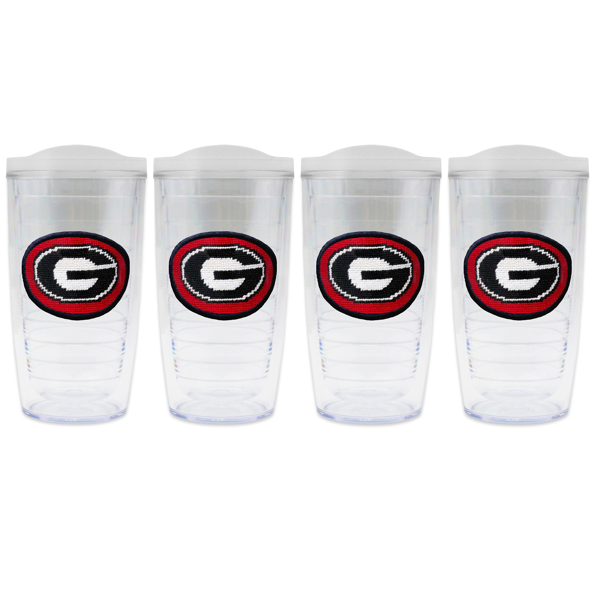 Set of 4 tumblers with lids on each in a line with a needlepoint logo in the center of each tumbler