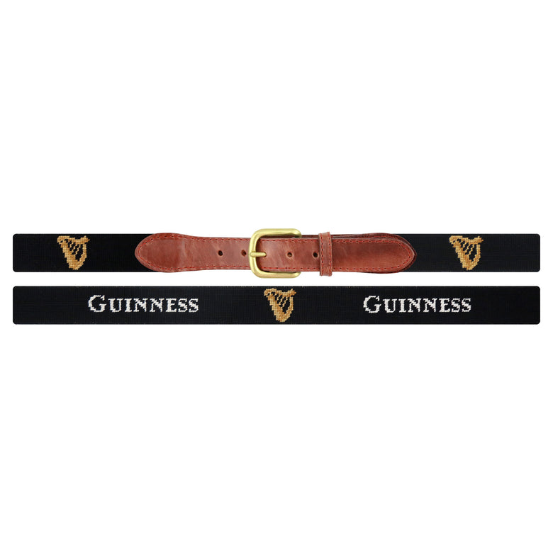 Flat view of Needlepoint Guinness Belt Black with brown leather trim and a brass buckle