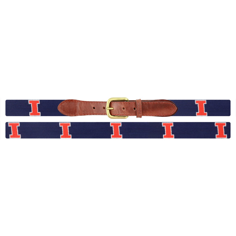 Flat view of Needlepoint Illinois Belt Dark Navy with brown leather trim and a brass buckle