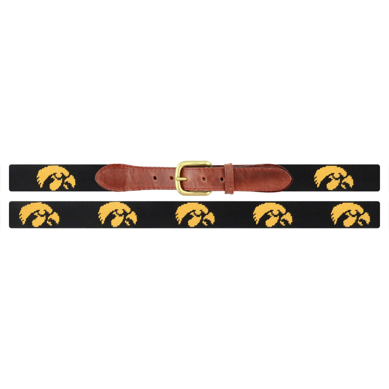 Flat view of Needlepoint Iowa Belt Black with brown leather trim and a brass buckle
