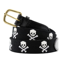Black belt with skull and crossbones pattern and gold buckle on a white background