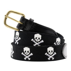 Black belt with skull and crossbones pattern and gold buckle on a white background