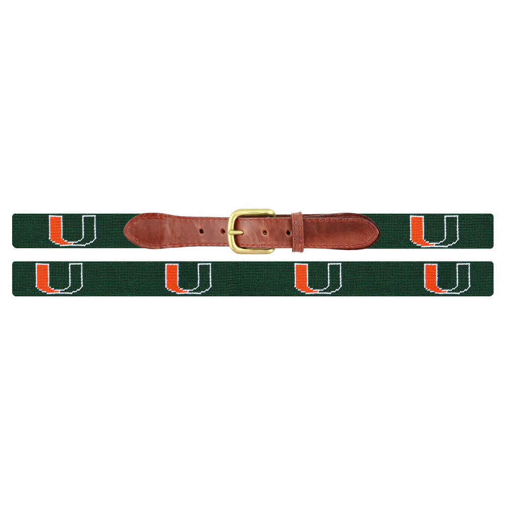 Flat view of Needlepoint Monogrammed University of Miami Belt FL Belt Deep Hunter with brown leather trim and a brass buckle