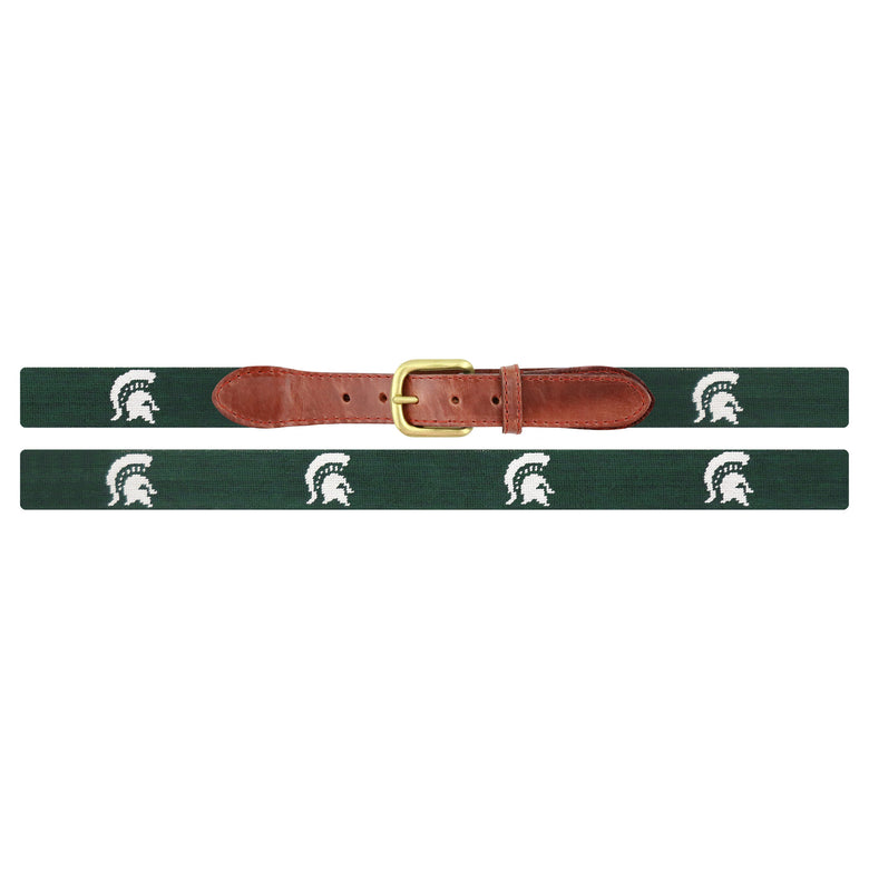 Flat view of Needlepoint Monogrammed Michigan State Spartan Belt Dark Pine with brown leather trim and a brass buckle