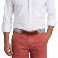 Model wearing Smathers and Branson Nantucket Red Pants with Pond Hockey needlepoint pattern