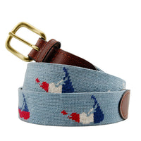 Nautical-themed belt with a gold buckle on a white background