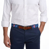 Model wearing Smathers and Branson Navy Pants with Ham and Egging needlepoint pattern