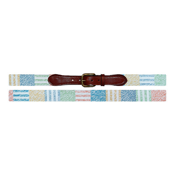 Woven belt with a leather buckle on a white background