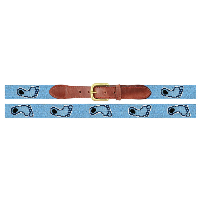 Flat view of Needlepoint UNC Tarheel Belt Light Blue with brown leather trim and a brass buckle