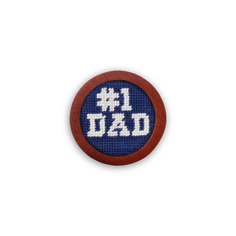 Classic navy golf ball marker with the phrase “Number One Dad” stitched in white needlepoint.