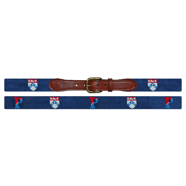 Flat view of Needlepoint University of Pennsylvania Belt Classic Navy with brown leather trim and a brass buckle