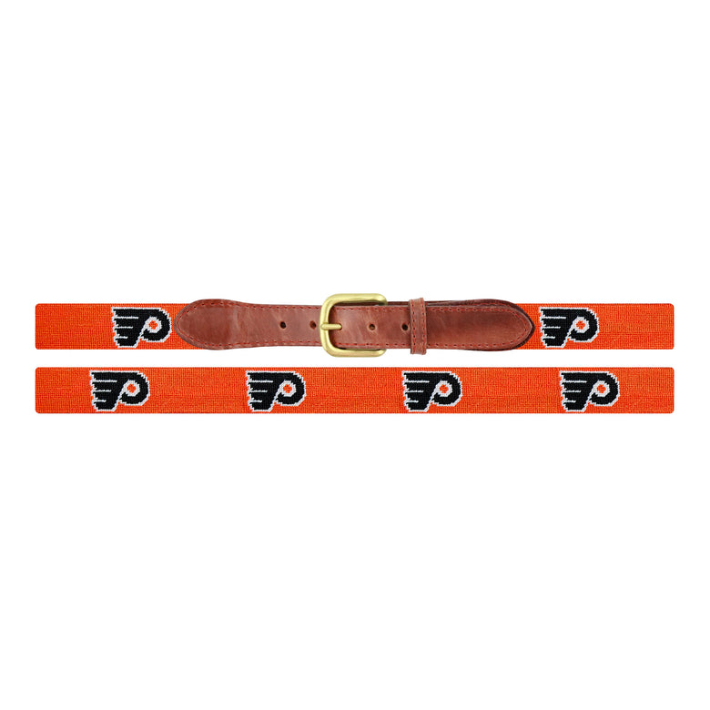 Flat view of Needlepoint Philadelphia Flyers Belt Orange with brown leather trim and a brass buckle