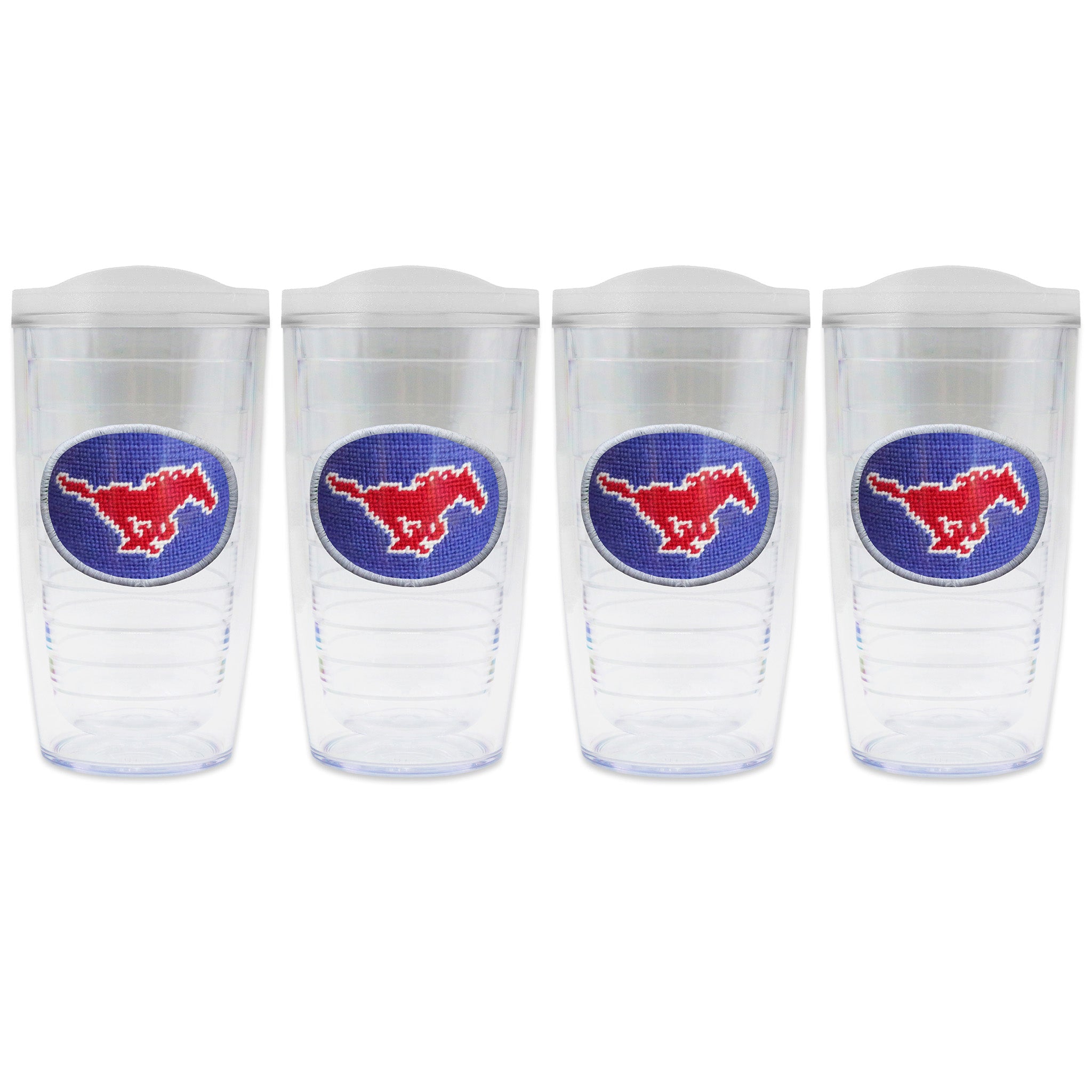 Set of 4 tumblers with lids on each in a line with a needlepoint logo in the center of each tumbler