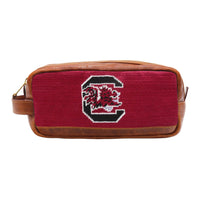 Garnet needlepoint toiletry bag featuring the South Carolina design with full grain Italian leather trim.