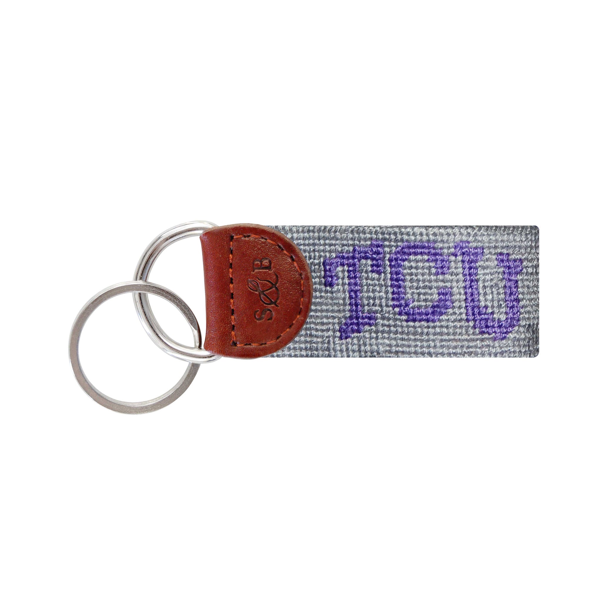 Gray needlepoint key fob with the purple TCU “Frog” logo, brown leather trim, and a metal key ring.