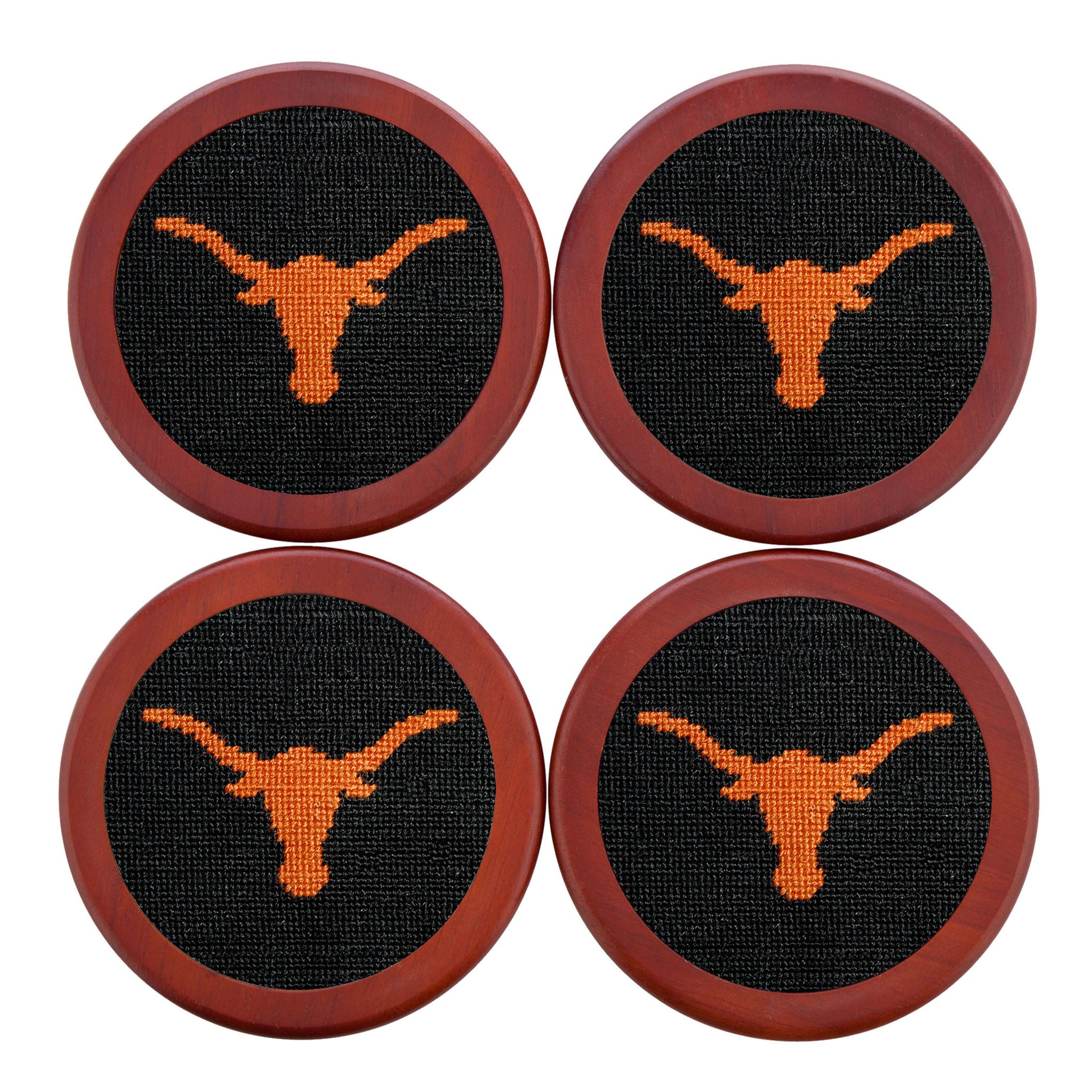 Black coaster featuring a stitched Texas design in white, shown laid flat.