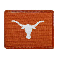University of Texas orange needlepoint bi-fold wallet with brown leather trim, shown from primary angle.