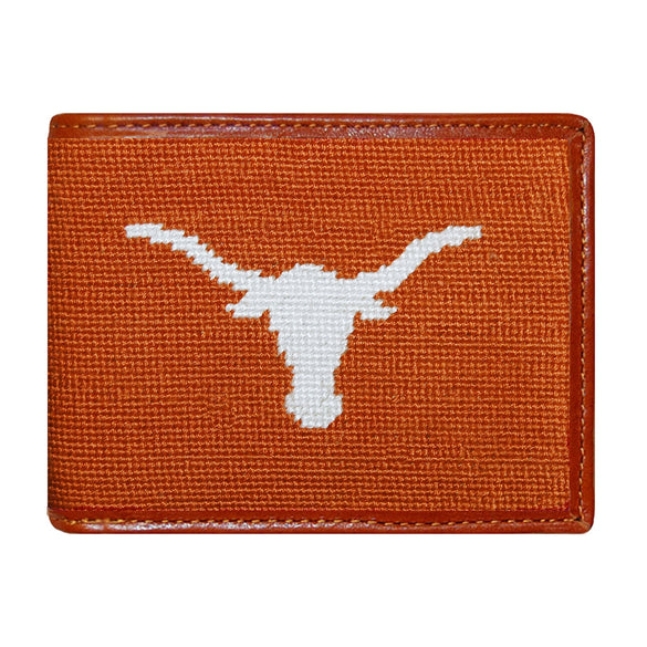 University of Texas orange needlepoint bi-fold wallet with brown leather trim, shown from primary angle.