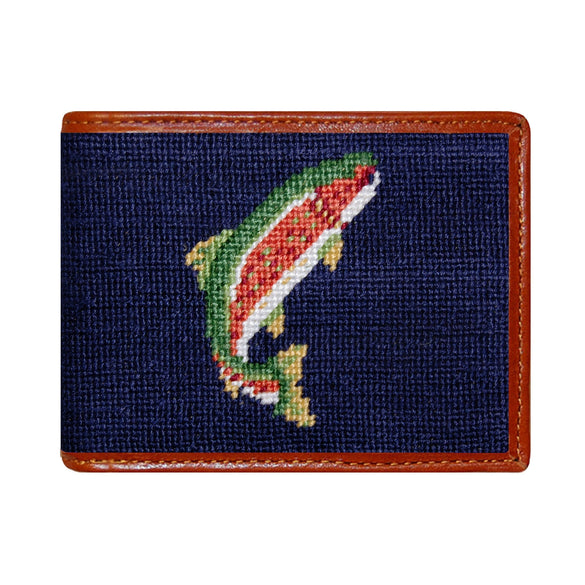 Dark navy Trout and Fly needlepoint bi-fold wallet with brown leather trim, shown from primary angle.