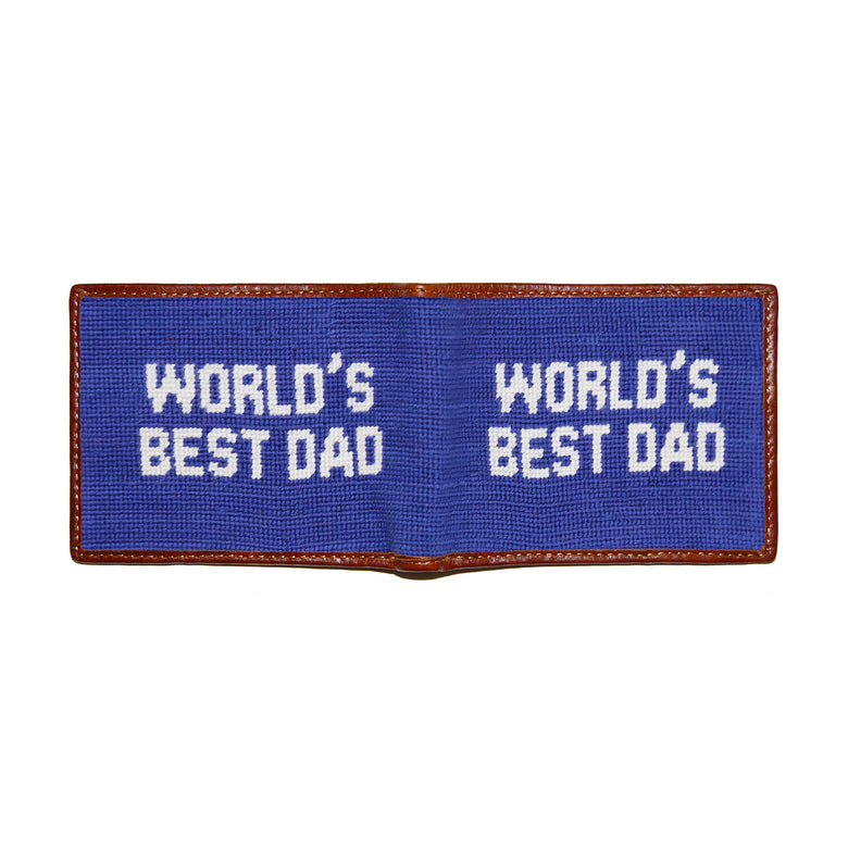 World’s Best Dad needlepoint bi-fold wallet in royal blue with chestnut leather trim, shown from secondary angle showing interior needlepoint.