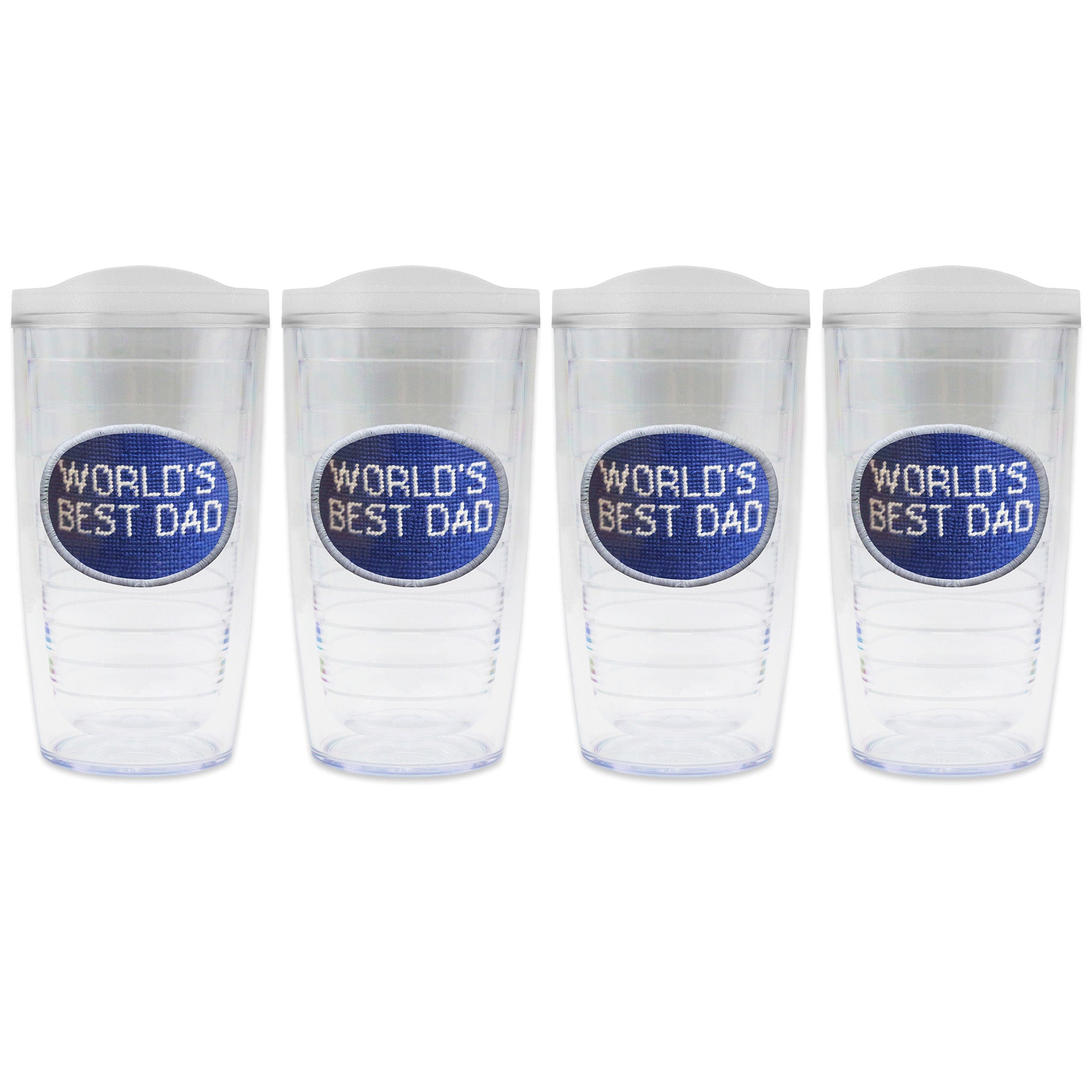 Set of 4 tumblers with lids on each in a line with a needlepoint logo in the center of each tumbler